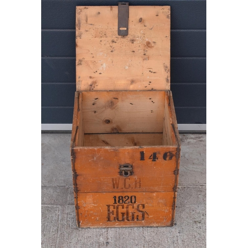 316 - A vintage 20th century wooden egg crate with either 'WCB' or 'WGB' with 'EGGS' on each side and a bo... 