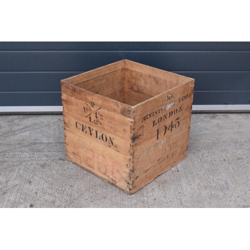 317 - A vintage wooden advertising crate with 'Ceylon' and 'London' marked onto the sides amongst other in... 