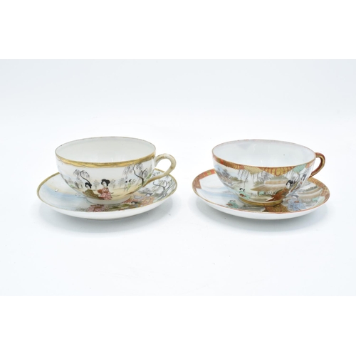 32 - A pair of Japanese export ware tea cups and saucers (2 duos).