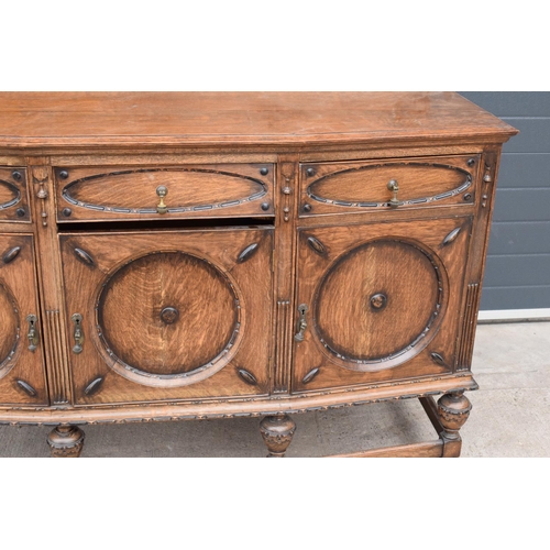 331 - An Edwardian carved sideboard with 3 drawers over 3 cupboards. 153 x 55 x 131cm. One drawer is in ne... 