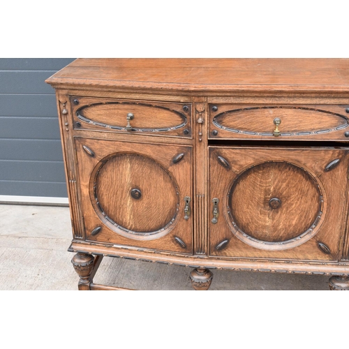 331 - An Edwardian carved sideboard with 3 drawers over 3 cupboards. 153 x 55 x 131cm. One drawer is in ne... 