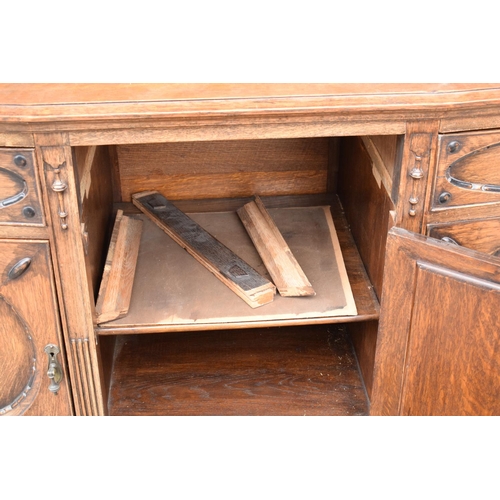 331 - An Edwardian carved sideboard with 3 drawers over 3 cupboards. 153 x 55 x 131cm. One drawer is in ne... 