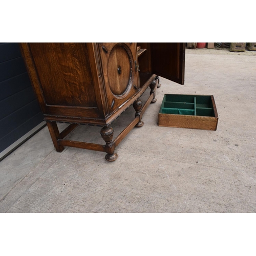 331 - An Edwardian carved sideboard with 3 drawers over 3 cupboards. 153 x 55 x 131cm. One drawer is in ne... 