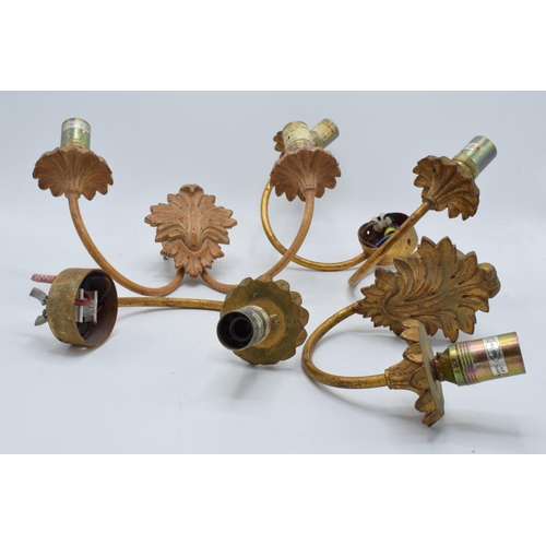 332 - A collection of Kevin McCloud wall lighting mounts in an ornate gilt-effect design max 40W. In used ... 