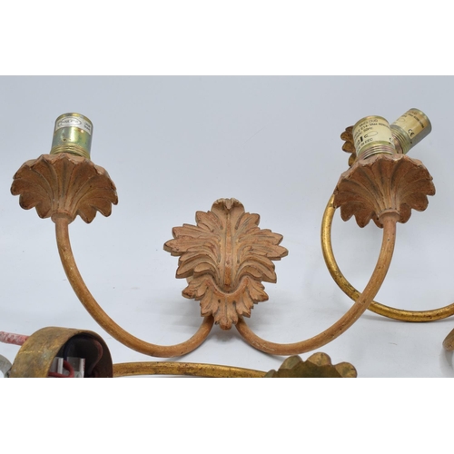 332 - A collection of Kevin McCloud wall lighting mounts in an ornate gilt-effect design max 40W. In used ... 