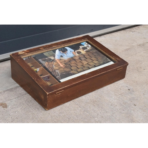 357 - An early to mid 20th century wooden and glass countertop cigar display case. 63 x 41 x 18cm.