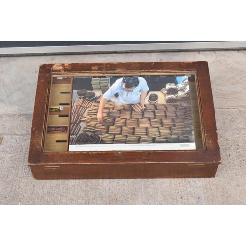 357 - An early to mid 20th century wooden and glass countertop cigar display case. 63 x 41 x 18cm.