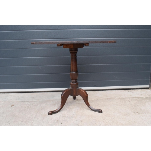 367 - A 19th century oak tripod table. 72cm tall. In good functional condition though as expected are show... 