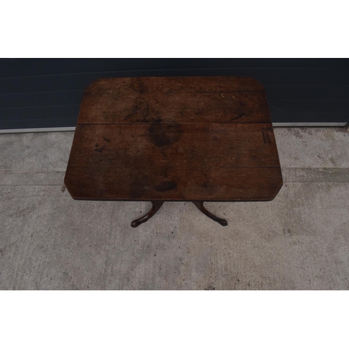 367 - A 19th century oak tripod table. 72cm tall. In good functional condition though as expected are show... 