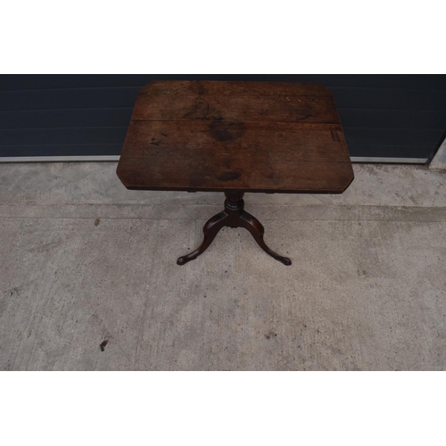 367 - A 19th century oak tripod table. 72cm tall. In good functional condition though as expected are show... 