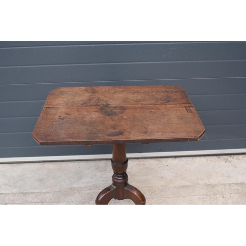 367 - A 19th century oak tripod table. 72cm tall. In good functional condition though as expected are show... 