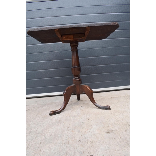 367 - A 19th century oak tripod table. 72cm tall. In good functional condition though as expected are show... 