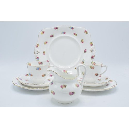 44 - A collection of Tuscan China tea ware in a floral pattern to consist of 12 cups, 11 saucers, 12 side... 