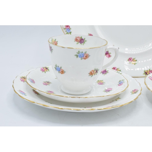 44 - A collection of Tuscan China tea ware in a floral pattern to consist of 12 cups, 11 saucers, 12 side... 