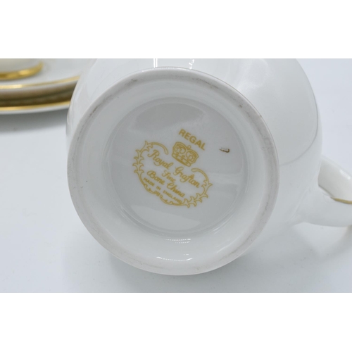 45 - A collection of Royal Grafton Fine Bone China tea ware in the Regal design to include duos and trios... 