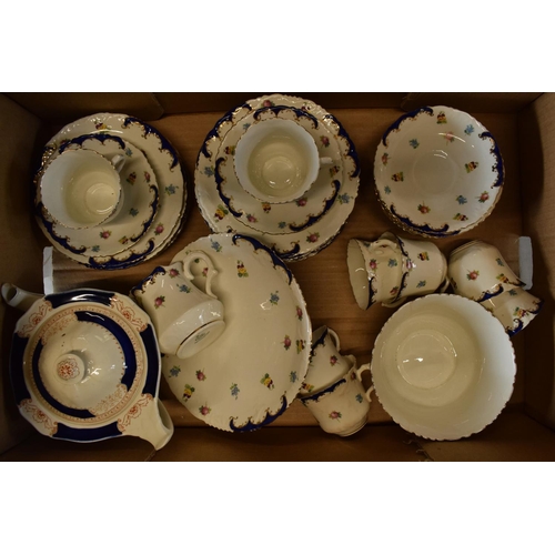 47 - The Paragon China blue floral tea set circa 1912 to consist of 8 trios, 4 further side plates, a cak... 