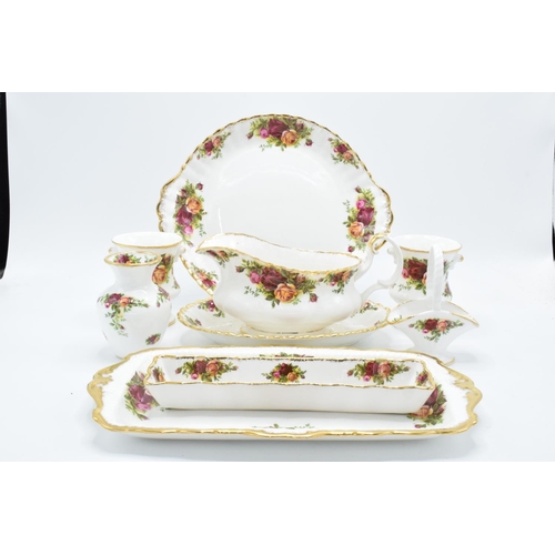 58 - A collection of Royal Albert Old Country Roses items to include a gravy boat and saucer, a cake plat... 