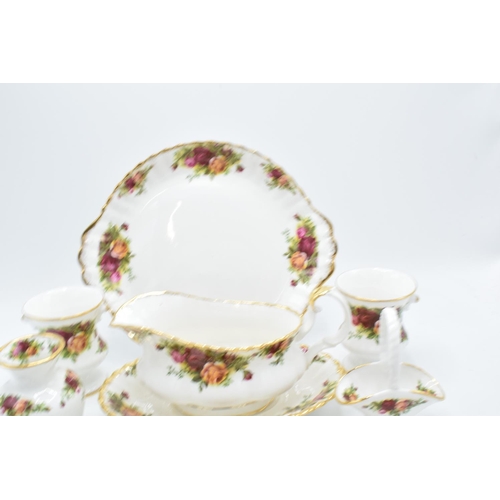 58 - A collection of Royal Albert Old Country Roses items to include a gravy boat and saucer, a cake plat... 