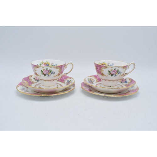 70A - A pair of Royal Albert trios in the Lady Carlyle design to consist of 2 cups, 2 saucers and 2 side p... 