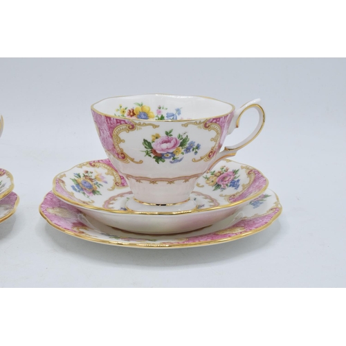 70A - A pair of Royal Albert trios in the Lady Carlyle design to consist of 2 cups, 2 saucers and 2 side p... 