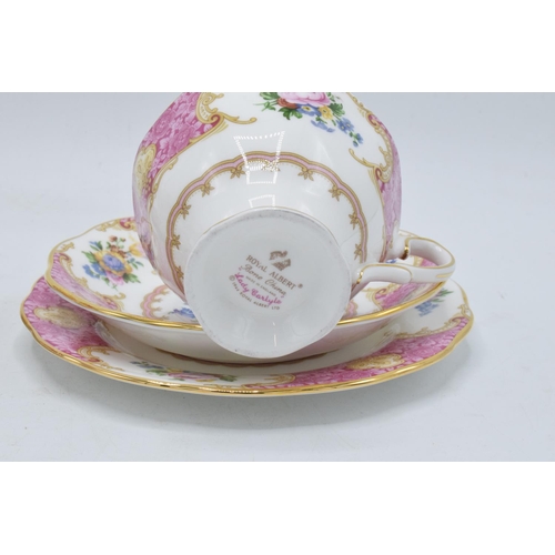 70A - A pair of Royal Albert trios in the Lady Carlyle design to consist of 2 cups, 2 saucers and 2 side p... 