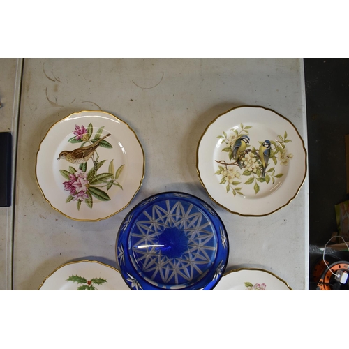 76 - A collection of Spode plates in the British Bird Series design x 4 together with a blue glass bowl i... 