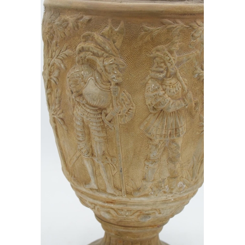 77 - Large continental moulded terracotta style vase depicting medieval or similar scenes, probably made ... 