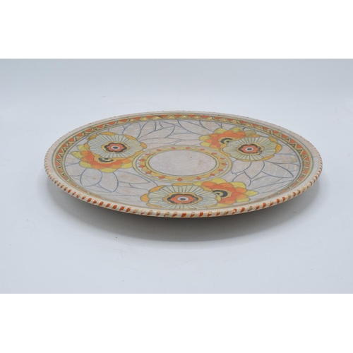 79 - Crown Ducal Charlotte Rhead 1930s tubelined charger in a stylised floral design 32.5cm diameter. In ... 