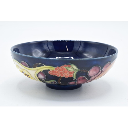 88 - Moorcroft shallow bowl decorated fruit and foliage 2000. In good condition with no obvious damage or... 