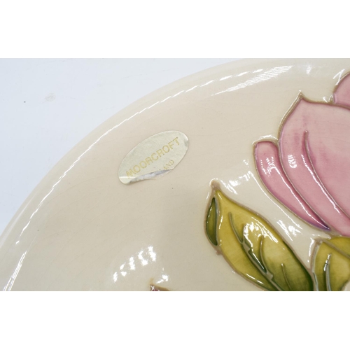 95 - Large Moorcroft plate in the Pink Magnolia design on a cream background with original Moorcroft stic... 