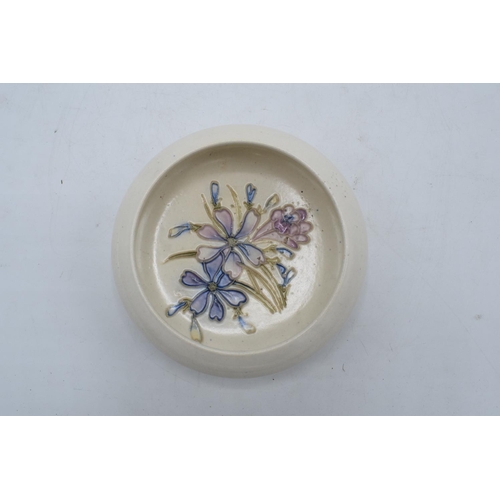 96 - Moorcroft pin tray/ pin dish decorated with a blue and pink floral design set on a cream background.... 