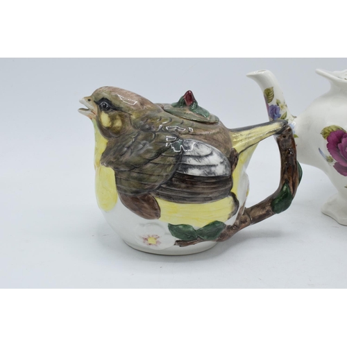 22A - A pair of teapots to include a Staffordshire Fine Ceramics Green Finch example and a Sadler floral e... 