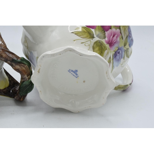 22A - A pair of teapots to include a Staffordshire Fine Ceramics Green Finch example and a Sadler floral e... 