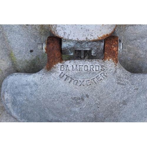 269C - A galvanised iron Cattle Double Drinking Bowl by Bamfords Uttoxeter. Hole drilled in the bottom for ... 