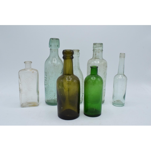 269D - A collection of vintage glass bottles to include local interest such as Uttoxeter, Whaley Bridge etc... 