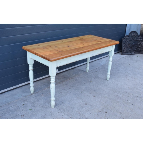 372 - A late 20th century pine topped kitchen table with painted shabby chic legs. 152 x 70 x 78cm tall. I... 