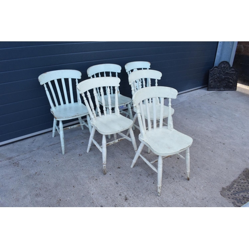 373 - A near matching set of 6 antique style hardwood kitchen chairs painted in a shabby chic style (6). A... 