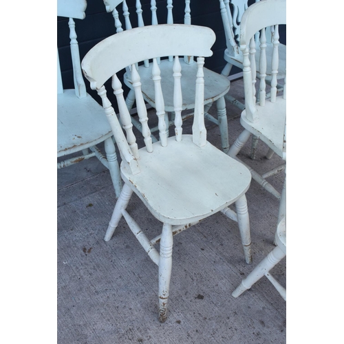 373 - A near matching set of 6 antique style hardwood kitchen chairs painted in a shabby chic style (6). A... 