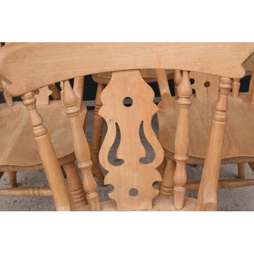 377 - A set of 6 matching antique style hardwood kitchen chairs with ornate backs (6). 84cm tall. Set 3. I... 