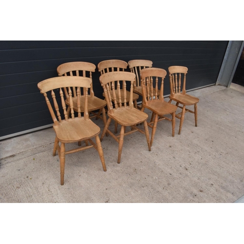 379 - A collection of near matching antique style hardwood kitchen chairs to include 4 spindle backed exam... 