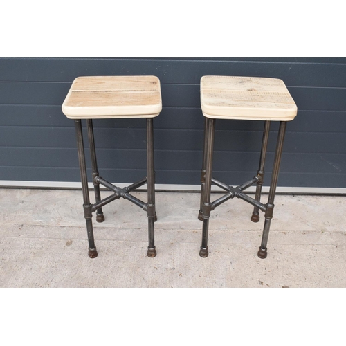 383 - A pair of modern industrial style pub stools with wooden seats (2). 76cm tall. In good functional co... 