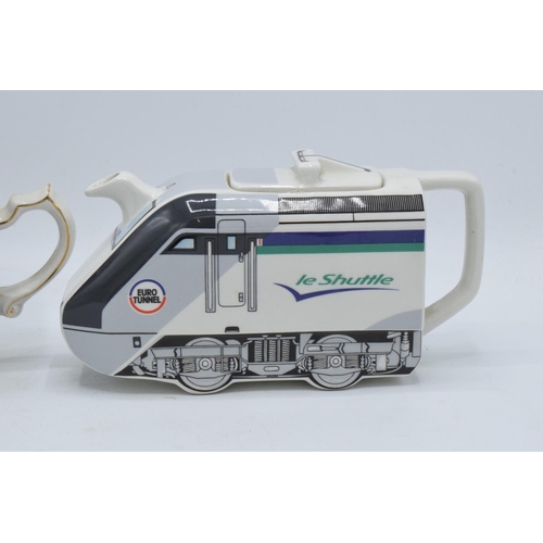 80A - A pair of James Sadler teapots to include Le Shuttle commissioned by Eurotunnel and Peter Pan made f... 