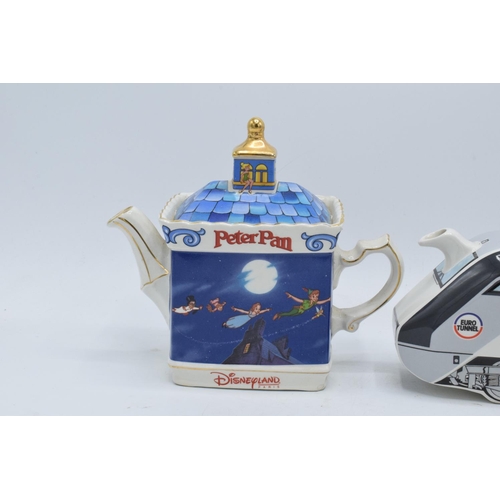 80A - A pair of James Sadler teapots to include Le Shuttle commissioned by Eurotunnel and Peter Pan made f... 