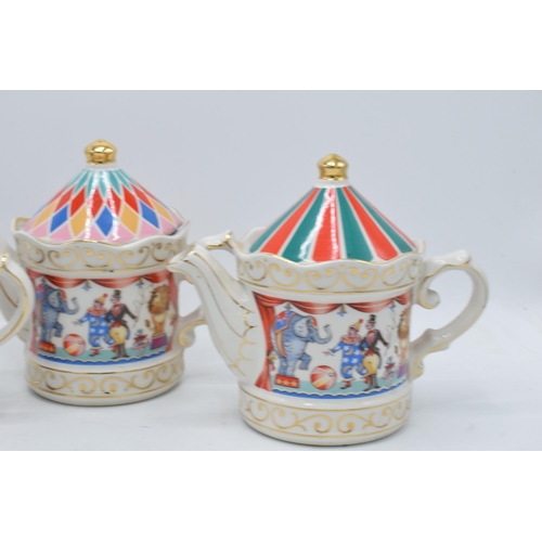 80C - A collection of James Sadler teapots to include Circus, Band Stand and the Circus (3). In good condi... 