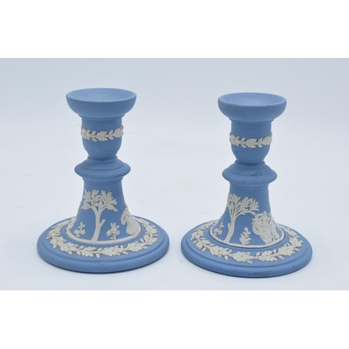 88B - A pair of Wedgwood blue Jasperware candlesticks (2). 12.5cm tall. In good condition with no obvious ... 