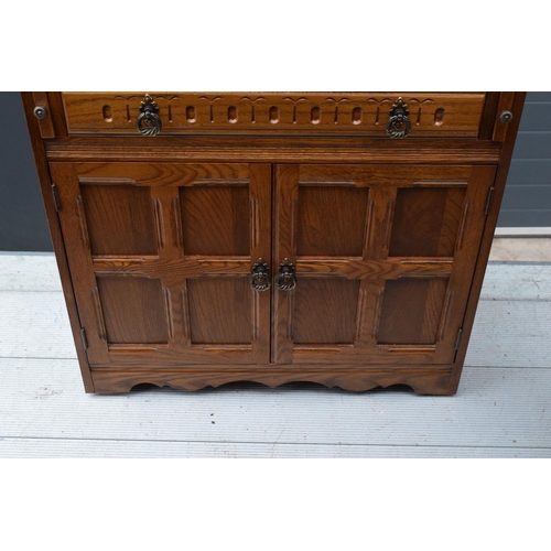 387 - A 20th century wooden bureau in the Old Charm style. 77 x 45 x 100cm.