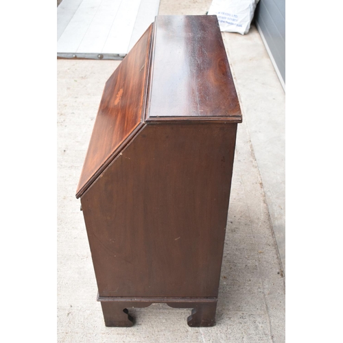 390 - A 19th century inlaid mahogany bureau with the fall front revealing a fitted interior inlaid with a ... 