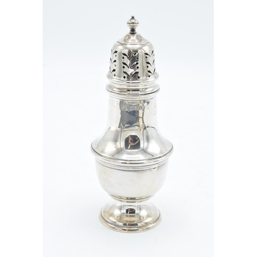 215C - A silver sugar sifter, Birmingham 1955. 80.4 grams. In good condition. 16cm tall.