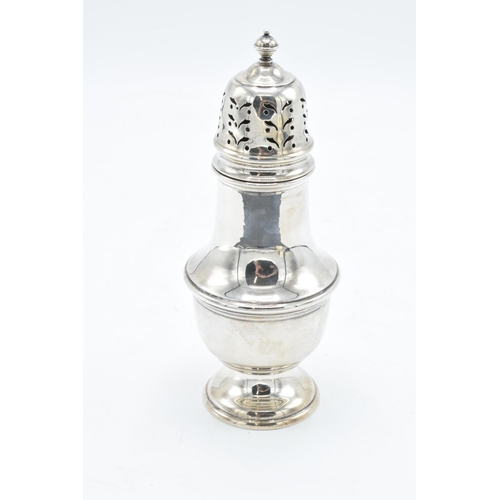 215C - A silver sugar sifter, Birmingham 1955. 80.4 grams. In good condition. 16cm tall.