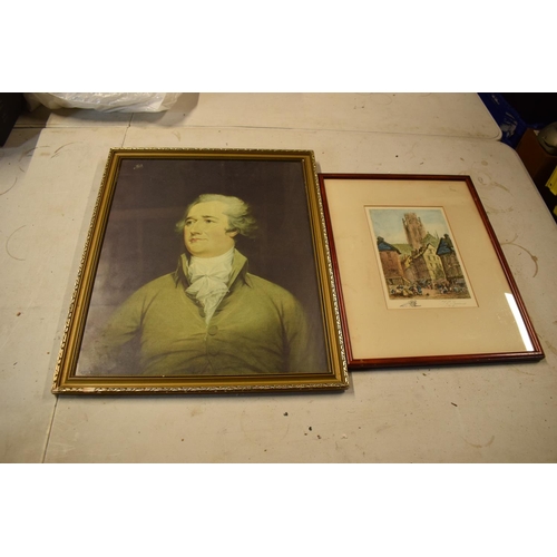 215I - A pair of 20th century framed prints, one of which depicting a gentleman, the other of a street scen... 